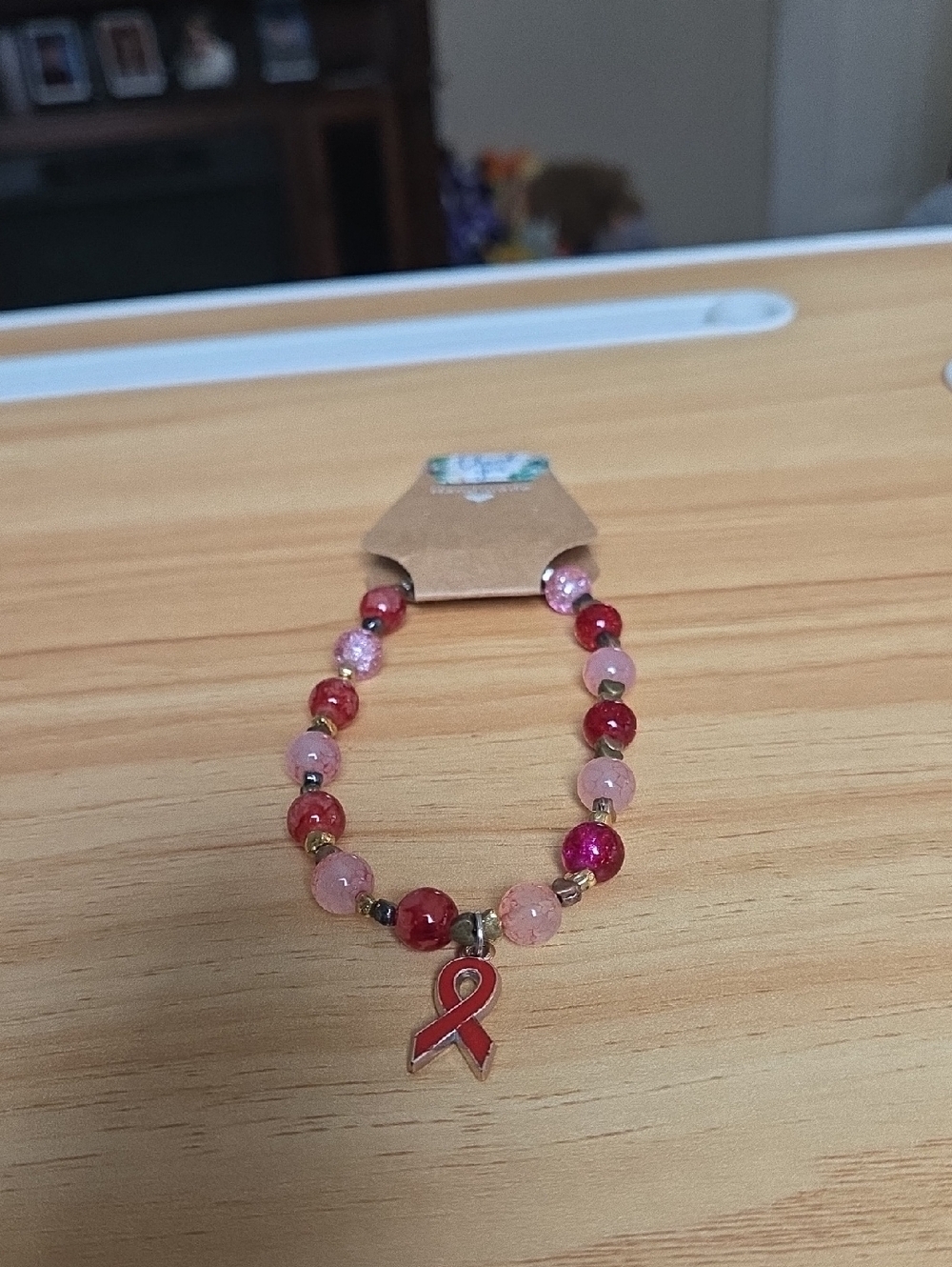 NWOT Red Ribbon Charm Stretch Bracelet  -  1007
